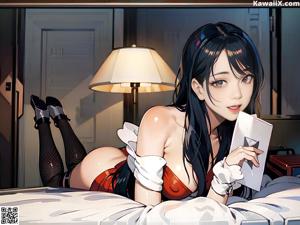 A woman in a blue dress sitting on a bed.